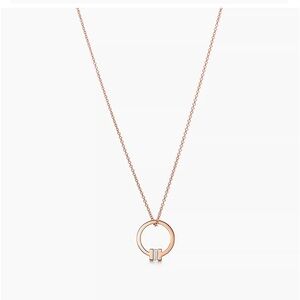 Tiffany Gold T Pendant with Baguette Diamond